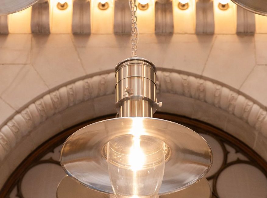 Milos Toronto architectural details with light pendants hanging from the ceiling