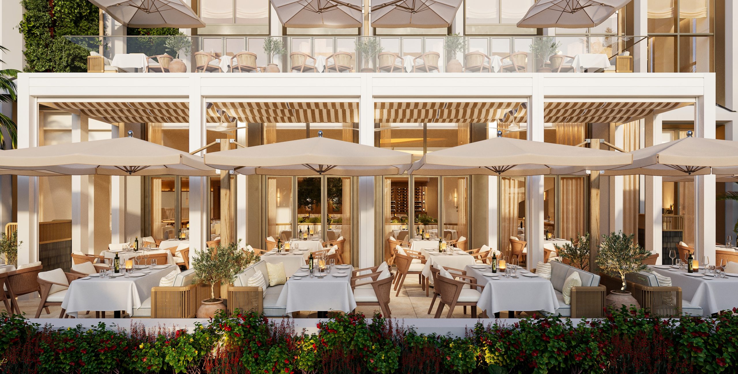 shaded outdoor dining at estiatorio milos west palm beach surrounded by lush gardens and the restaurant behind